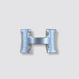 Hermès H belt buckle in palladium hardware & black reversible leather strap